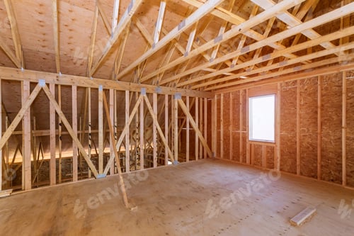 Preview: Unfinished attic of a private house residential construction house framing agains