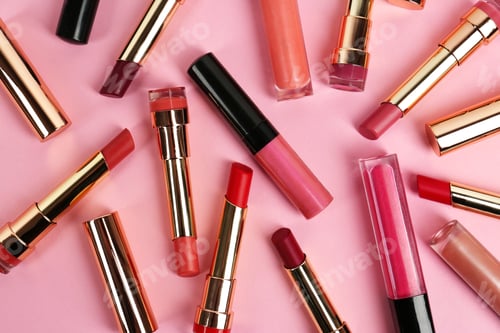 Preview: Set of bright lipsticks on pink background, flat lay