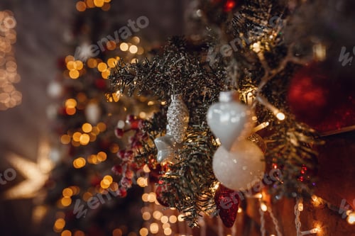 Preview: Beautiful holiday decorated home room with Christmas tree and gifts under it