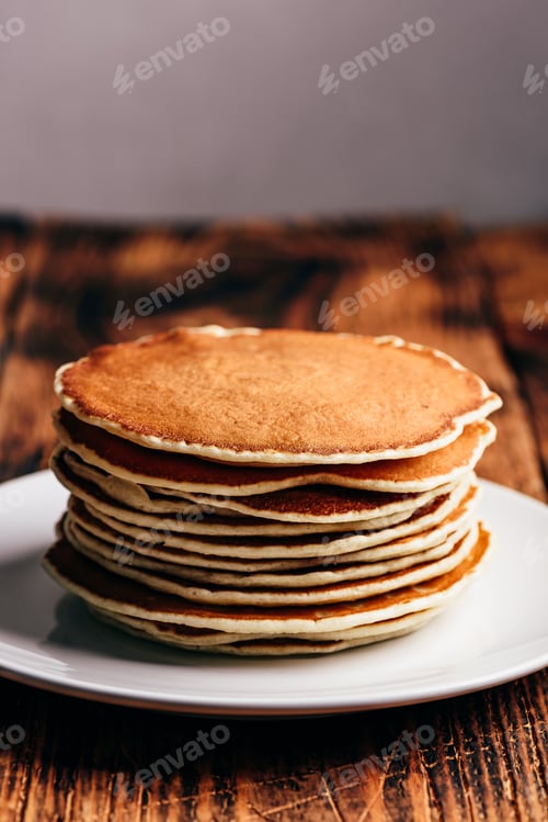 Preview: Stack of american pancakes on white plate