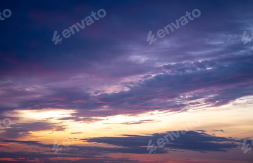 Preview: Dramatic dark moody purple and orange sunset sky. Natural background