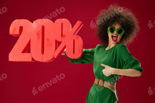 Preview: Beauty Fashion woman green dress afro hairstyle dark glasses twenty percent in hands color