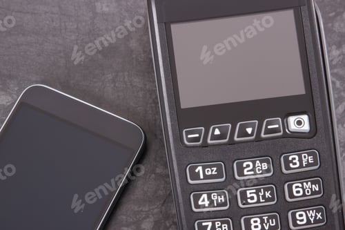 Preview: Credit card reader and mobile phone with NFC technology for cashless payment transaction