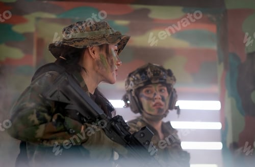 Preview: Two woman soldiers stand together and discuss the plan for fighting in the base of defensive