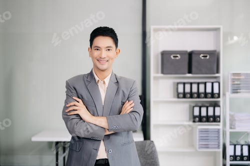 Preview: Young attractive businessman office worker business suits smiling at camera in office