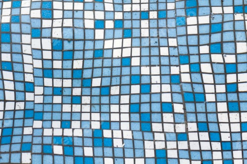 Preview: Close up picture of small square blue and white shiny ceramic tiles. Background, bathrooms and pools