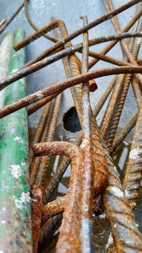 Preview: Vertical closeup shot of rusty rods bars