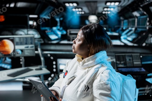Preview: Woman in orbital station analyzing Mars planetary information on tablet