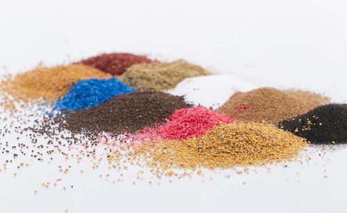 Preview: Closeup of different colorful spices on the table under the lights isolated on a white background