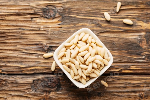 Preview: pine nut on the wooden table