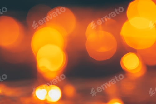 Preview: Abstract Gold bokeh sparkle on dark background