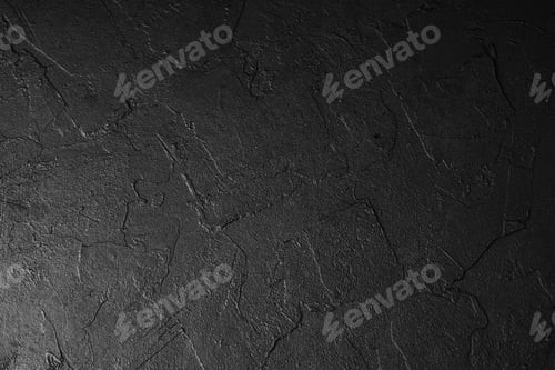 Preview: Black textured background surface with cracked pattern