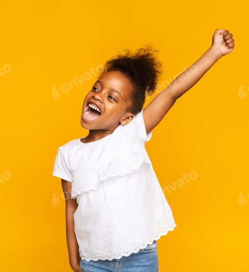 Preview: Cute african toddler girl shouting hooray on orange background