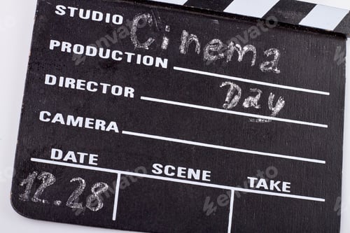 Preview: 28 december world cinema day. Close-up cinema clapperboard.