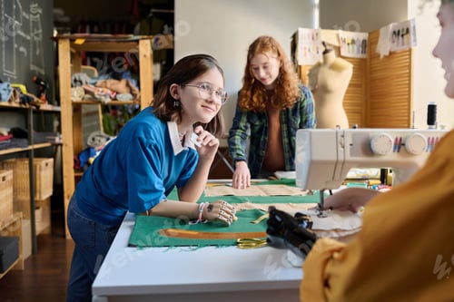 Preview: Diverse Group of Girls Making Clothes in Sewing Class in School