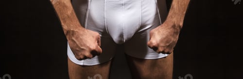 Preview: man in white briefs with a fist