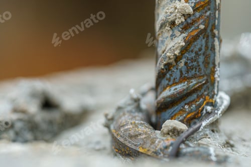 Preview: a close - up of a rusty iron bolt with other rusting elements