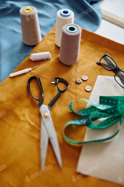 Preview: Dressmaking tools on the table, top view, nobody
