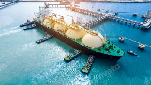 Preview: LNG (Liquefied natural gas) tanker anchored in Gas terminal gas tanks for storage. Oil Crude Gas