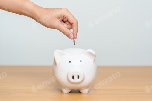 Preview: Saving Money Putting Coin into Piggy Bank