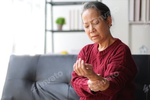 Preview: Senior woman with arm pain and wrist pain.