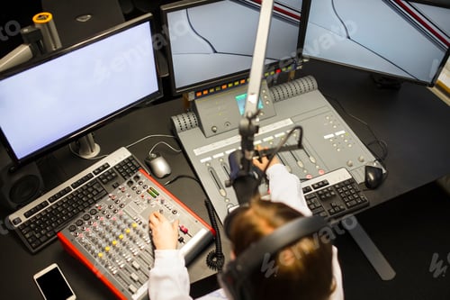 Preview: Female Jockey Using Music Mixers And Screens In Radio Studio