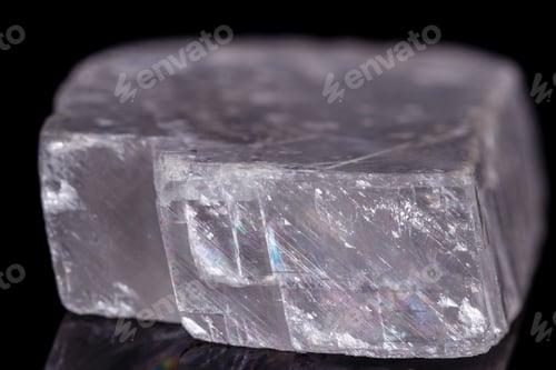 Preview: Macro mineral stone Iceland spar on black background