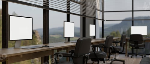 Preview: Modern office co-working space interior with workstation against the glass wall, computer mockup