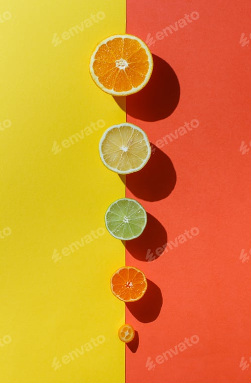 Preview: Citrus fruits on a coral red and yellow background