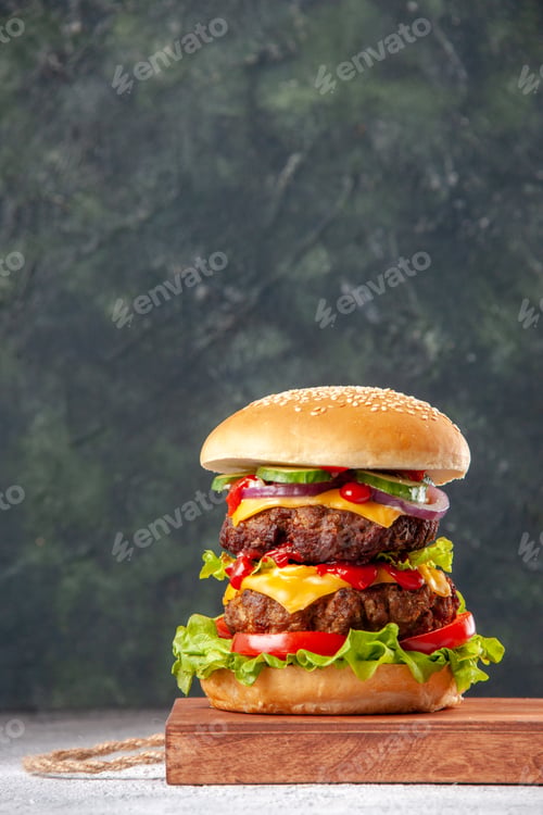 Preview: Front view of delicious homemade sandwich on wooden board on blurred background
