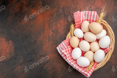 Preview: top view white chicken eggs inside basket with towel on dark background raw farm photo animal meal