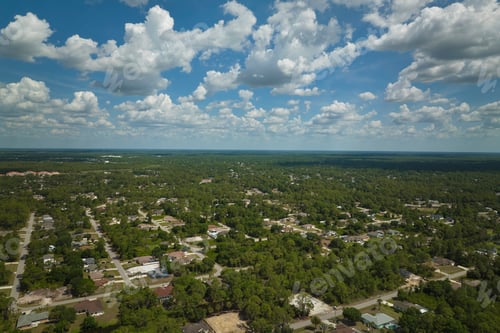 Preview: Aerial view of small town America suburban landscape with private homes