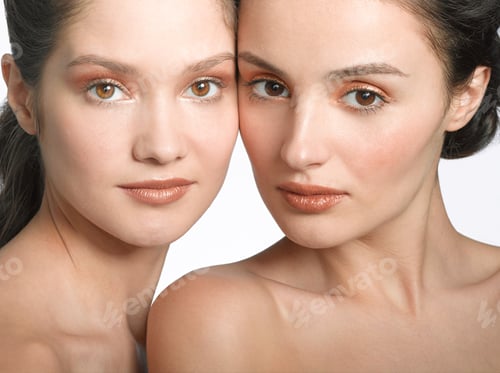 Preview: Portrait of two young women side by side