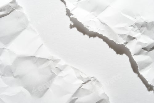 Preview: Close-up of torn white paper with rough edges and textured surface creating