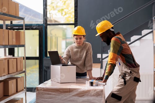 Preview: Stockroom supervisor analyzing merchandise inventory report