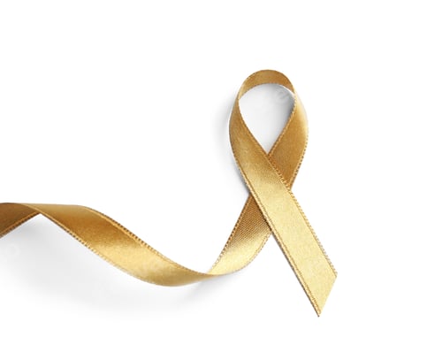 Preview: Gold ribbon on white background, top view. Cancer awareness