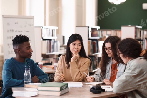 Preview: International Group of Students at Table