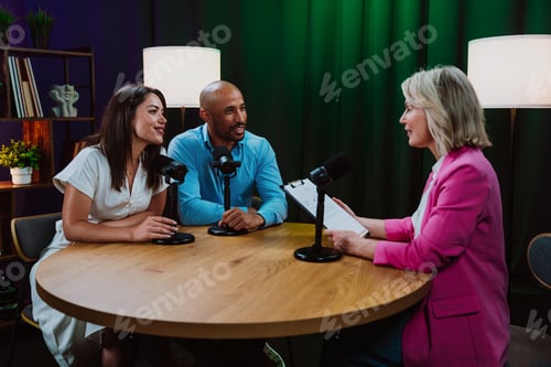 Preview: Content creators recording a podcast interview in studio