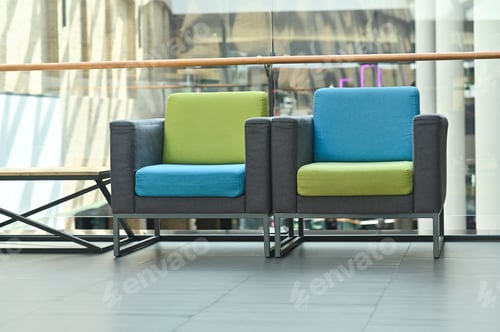 Preview: Two armchairs standing spacious hall