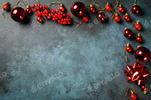 Preview: Christmas composition. Frame made of christmas decor and toys on dark background.