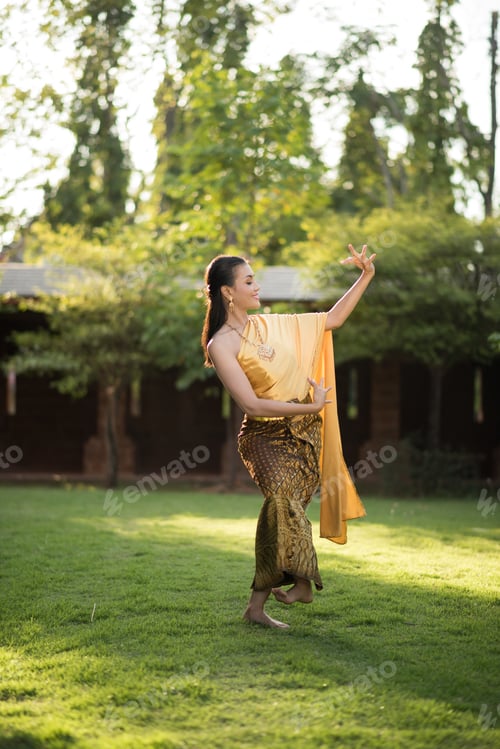 Preview: Beautiful Woman wearing typical Thai dress