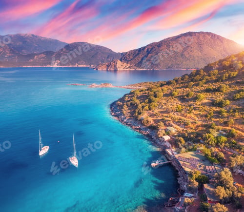 Preview: Aerial view of beautiful yachts and boats on the sea at sunset