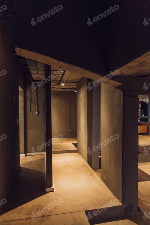 Preview: Interior View of a Concrete Hallway at Night