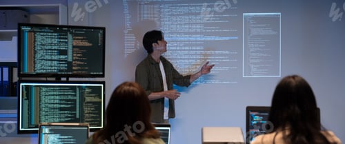Preview: Asian man presenting code with projector in software development meeting