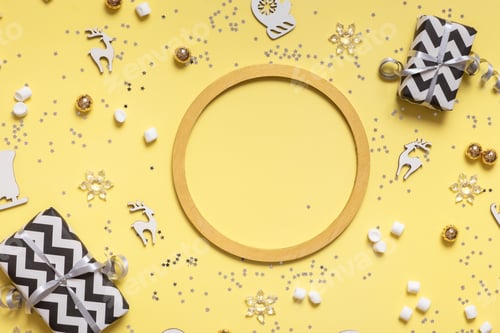 Preview: Wooden frame and Christmas decorations on colored background top view