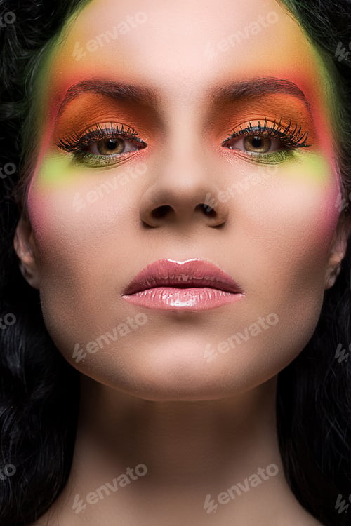 Preview: Attractive woman with colored make-up