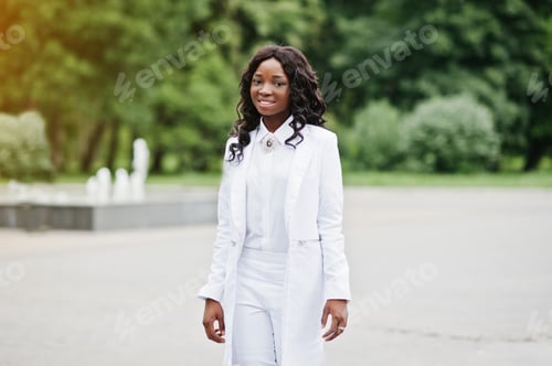 Preview: Stylish and beautiful black african american girl background fountain at city