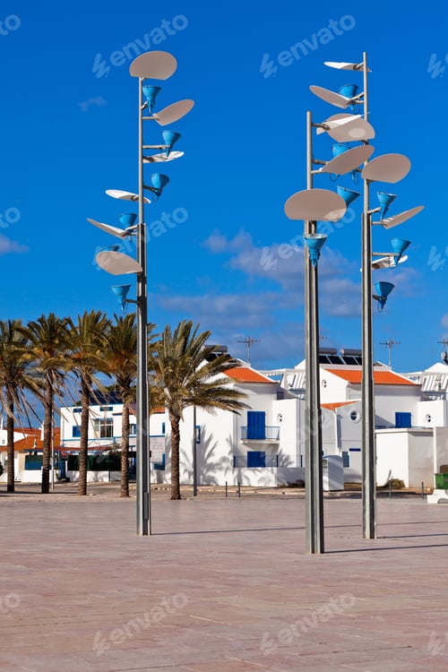 Preview: View of town square with modern lamps. Manta Rota, Portugal