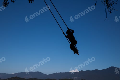Preview: Playing on traditional bamboo swing.
