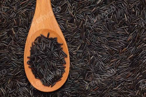 Preview: Wild rice in a wooden spoon